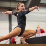 Free State’s Huston takes all-around crown at Emporia Invitational, leads Firebirds gymnastics to runner-up finish; Lawrence delivers its best score of season